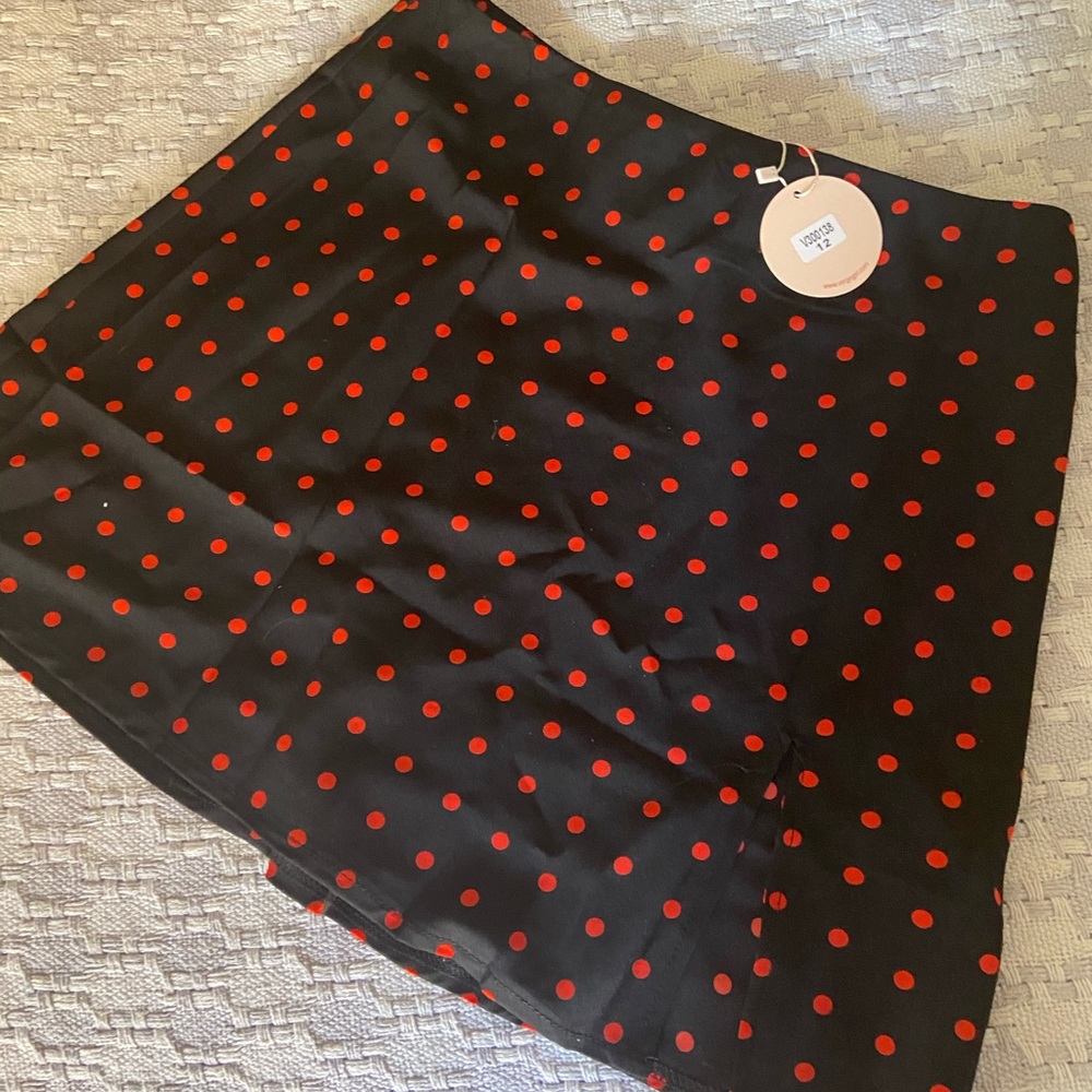 Polka dot black and red slit mini skirt